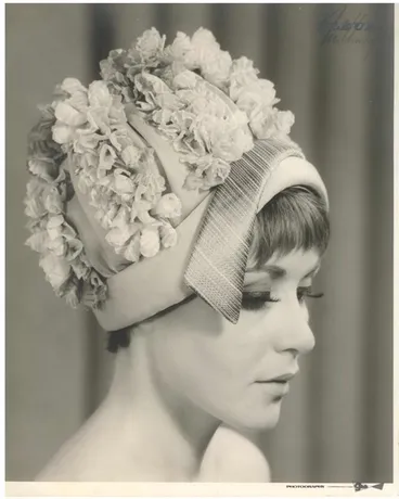 Image: Bonnet-style hat decorated with flowers