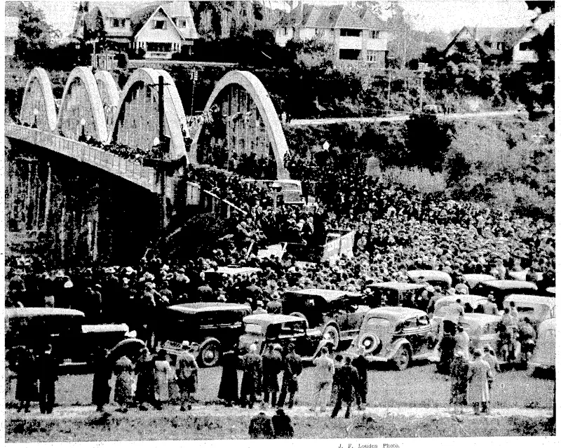 Last pjeekend"a new; ferro-co'ncrete bridge, costing £26,000, was opened at Hamilton by the Hon. R. Sample, 'Minister of Public' Works. The photograph shows the scene while speakers-were addressing .' '..... ■"'■ ' : the,crowd. , ... (Evening Post, 28 April 1937)