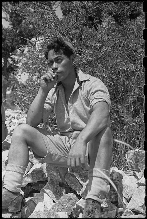 M Tonihi listening to address by Prime Minister Peter Fraser at NZ Advance Base, Italy, World War II - Photograph taken by George Bull