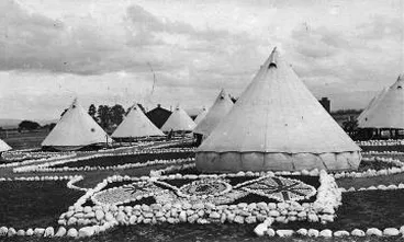 Stonework decorations in front of tents at a Featherston military camp Image: Stonework decorations in front of tents at a Featherston military camp