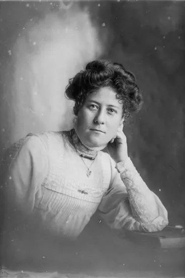 Image: Miss Swanson leaning her left elbow on books, 1909