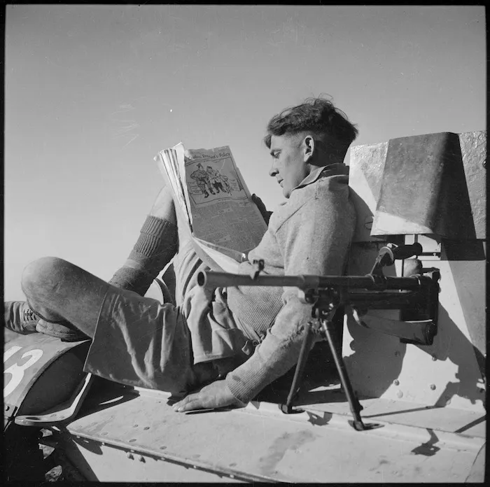NZ bren carrier driver filling in time before mock battle, Egypt