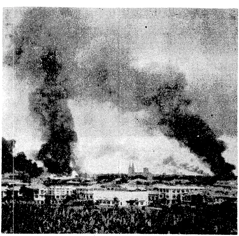 U.S. Offlce of War Information Photo Smoke clouds obscure the sun as the Japanese demolition squads attempted to destroy Manila, capital of the Philippines. (Evening Post, 06 March 1945)