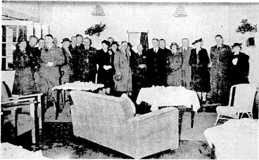 Image: Evening Post" Photo. Some of those who were present yesterday at the opening of the club rooms for W.A.A.F. xvorlters at Rongotai Air Force Station. Tlie picture shows the Minister of Defence, Mr. F. Jones, who opened the club, the Hon. W. Perry M.L.C, Mrs. P. Fraser, Mrs. F. Jones, Group Captain H. W. L. Saunders, and Wing Commander T. W. White. (Evening Post, 17 June 1941)