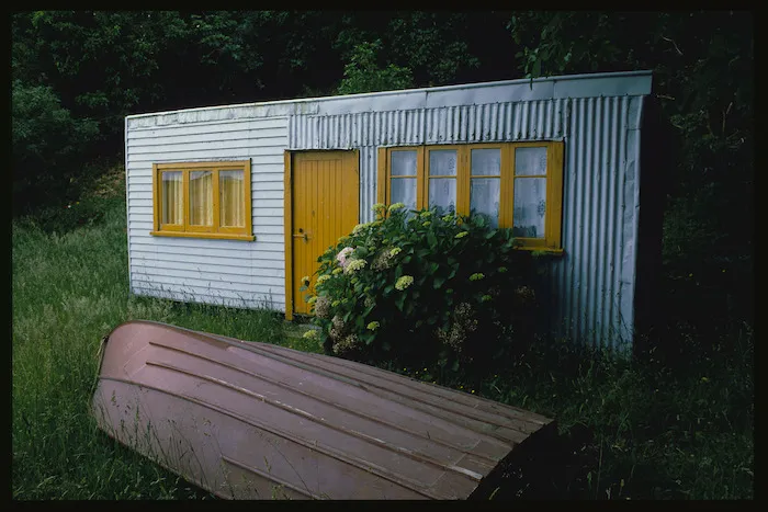 Bach and dinghy, South Island east coast