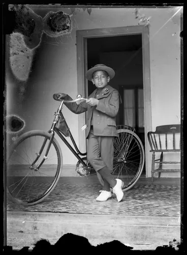 Image: Boy with a bicycle