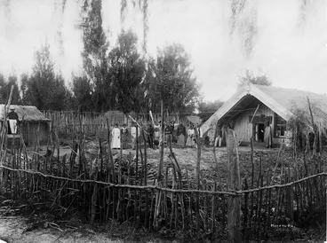 Image: People standing next to the meeting house at Maketu Pa, Bay of Plenty