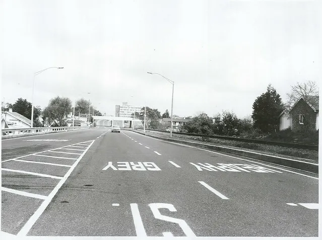 The road approach to the recently completed Claudelands Bridge, with the State Advances building in the background, Hamilton