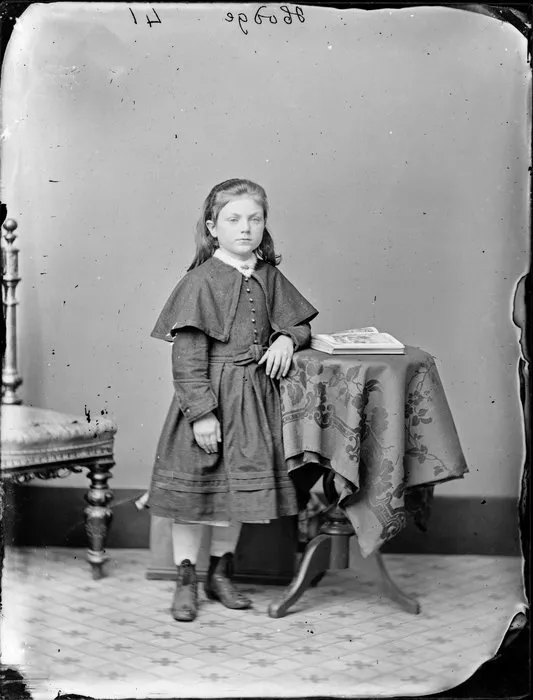 Miss Hodge, with an open book