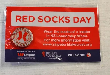 Image: Badge: Red Socks Day/ Sir Peter Blake Trust