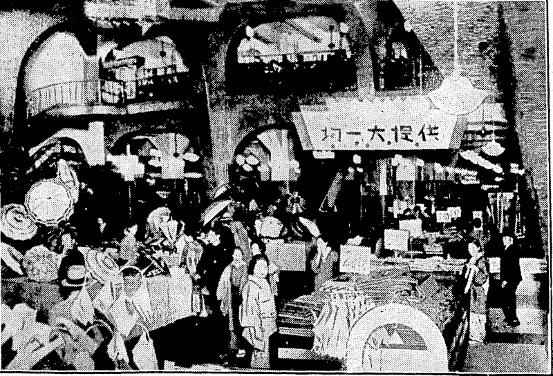WESTERMSED JAPAN.—An interior view of one: of the. eight large department stores in Tokio a Western idea which has^ proved very, successful among Japanese shoppers. The tenth and; final article on Japanese social questions and Japan s relations with the world generally appears elsewhere in ttiis issue (Evening Post, 23 February 1934)