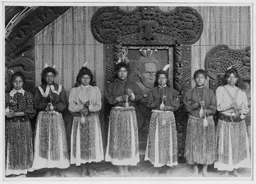Image: Unidentified women with poi outside the Te Rauru meeting house, Whakarewarewa, Rotorua
