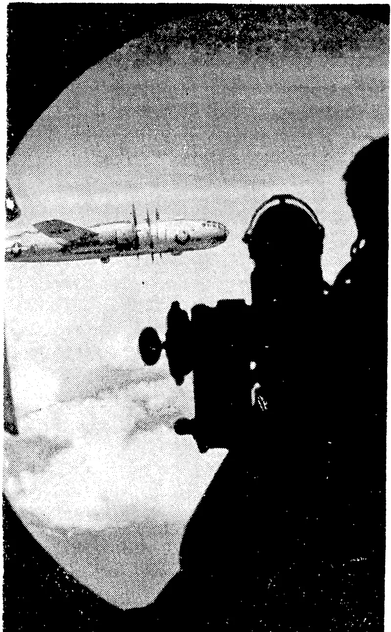 This Super-Fortress, seen through the "blister" of a sister aircraft, i: on its ivay with one of the many air expeditions by ivhich. Japan i cities and industries were virtually wiped out. (Evening Post, 15 August 1945)
