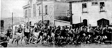 Image: Evening Post" Photo. Harriers starting out last Saturday from the Star Boating Club's shed for the first run of the season, af.t€& Mr. A. C.' Kitto, president of the Wellington Centre of the N.Z.A.A.A., had officiated at the opening* ' – ' (Evening Post, 22 April 1939)