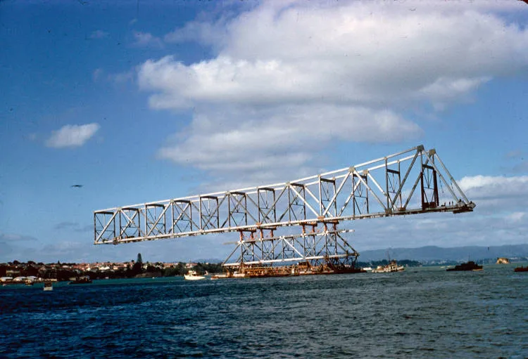 Moving the pick-a-back section of the Auckland Harbour Bridge into place, 1958