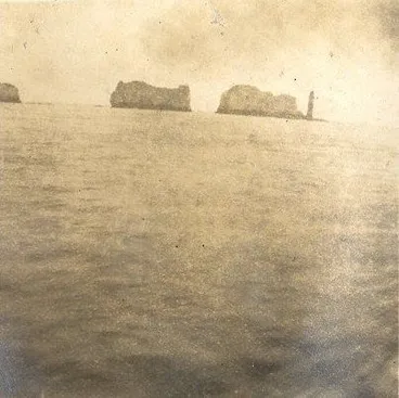 Image: 2 rocks and lighthouse.