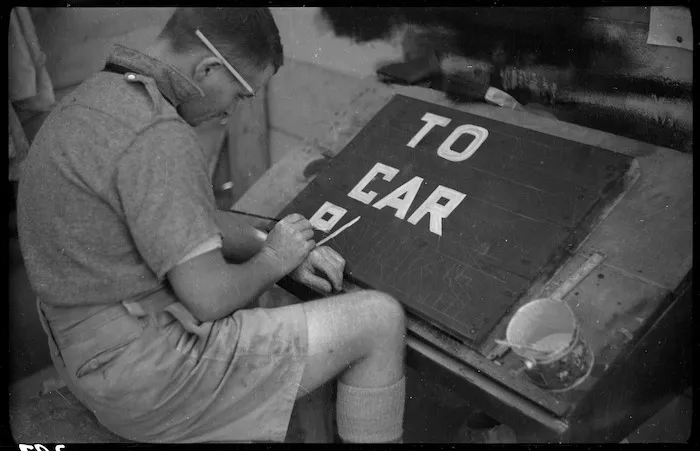 Sign writer at work, Egypt