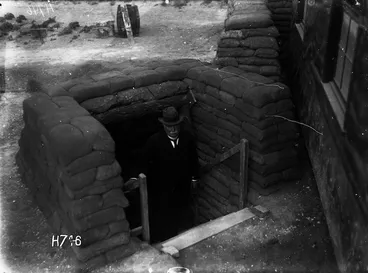 Image: William Massey emerging from a dug-out in Etaples, France