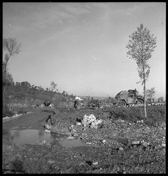 A tractor and gun of the New Zealand Artillery towed on its way to the forward areas of the Sangro River Front, Italy