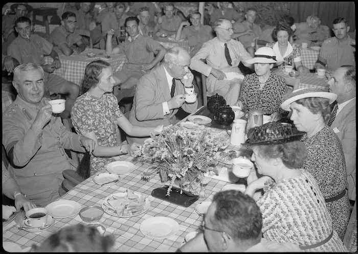 Prime Minister Peter Fraser seated in the Maadi tent