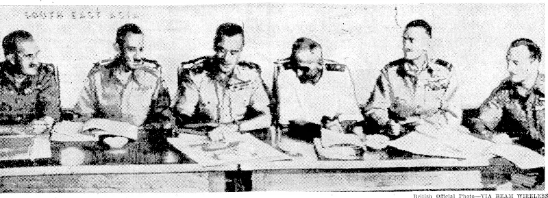 Chiefs of South-east Asia Command drawing up the surrender terms to be fonifarded to the Japanese in their area. From the left, General Sir William Slim, Lieut-General Raymond Wheeler, Admiral Lord Louis Mount-batten, Rear-Admiral A. J. Power, Air Marshal Sir Keith .... . Park, and General F. A. M. Browning. (Evening Post, 28 August 1945)