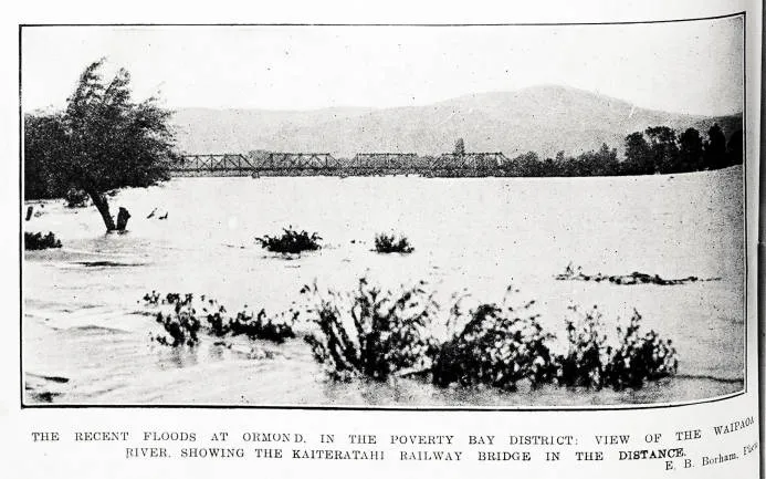 The recent floods at Ormond, in the Poverty Bay district: view of the Waipaoa River, showing the Kaiteratahi railway bridge in the distance