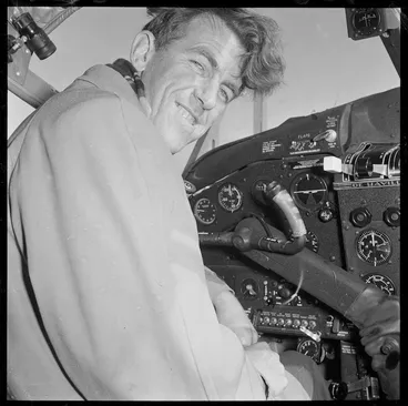 Image: Sir Edmund Hillary in the cockpit of the Trans-Antarctic Expedition's aeroplane, Rongotai, Wellington