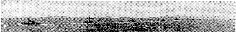 The first picture of the American advance into Kiriwina and Woodlarh Islands, showing part of a long line of small ships on their way. Unknown to the Japanese, landings were made on both these islands and were quickly consolidated. (Evening Post, 28 July 1943)