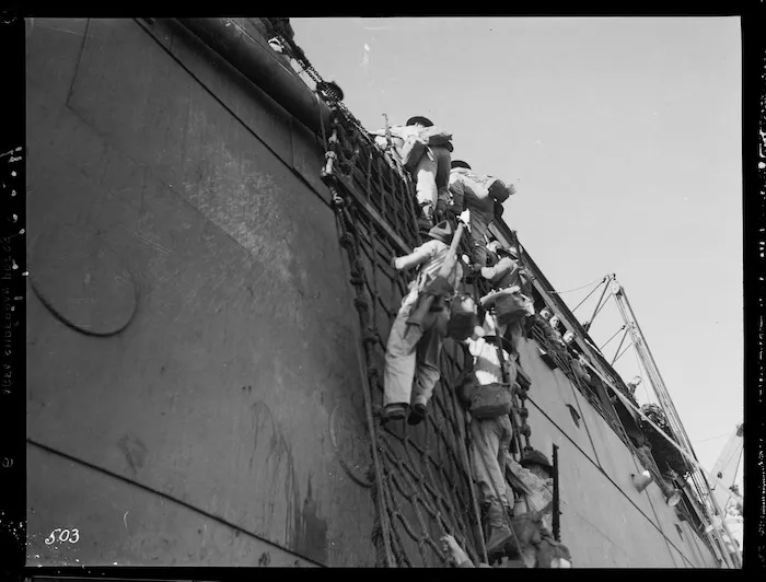 New Zealand soldiers on a ship's rope ladder in the Pacific, during World War II