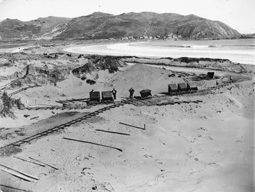 Image: Sandhills alongside Lyall Bay, Wellington, with railway track and wagons
