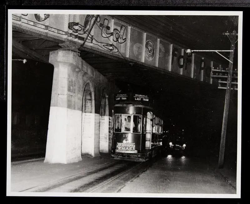 The Avondale Last Tram 171 passing under Morningside railway overbridge at night