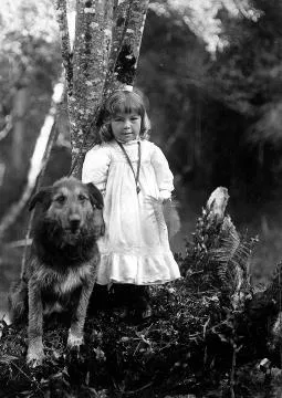 Unidentified child and dog