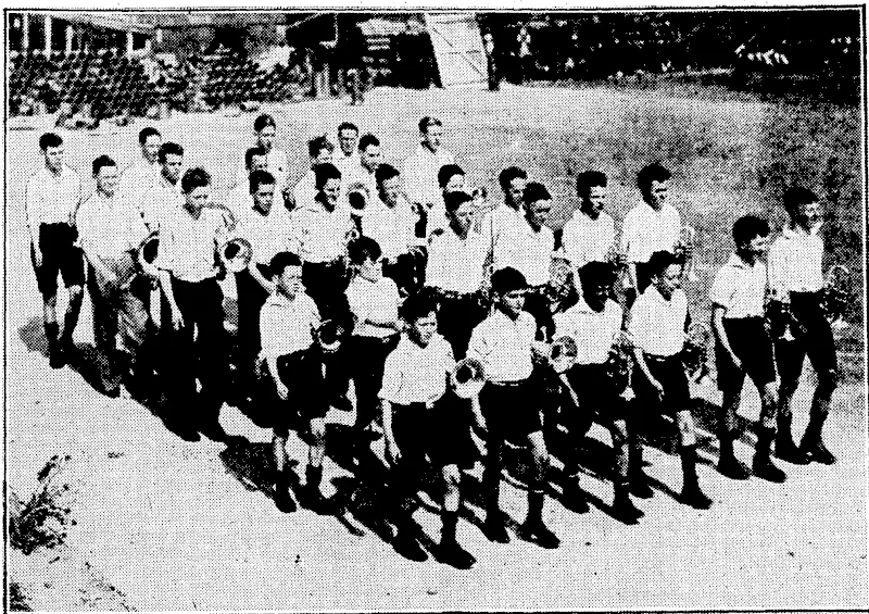 Evening Post" i'noto. A NEW WELLINGTON BAND.—A parade of the Wellington Junior Band, which has been in training for some time and has already made several public appearances. The band is now being'trained inmarching movements to take part in: the Newtown School jubilee celebrations on October 27. (Evening Post, 25 September 1934)
