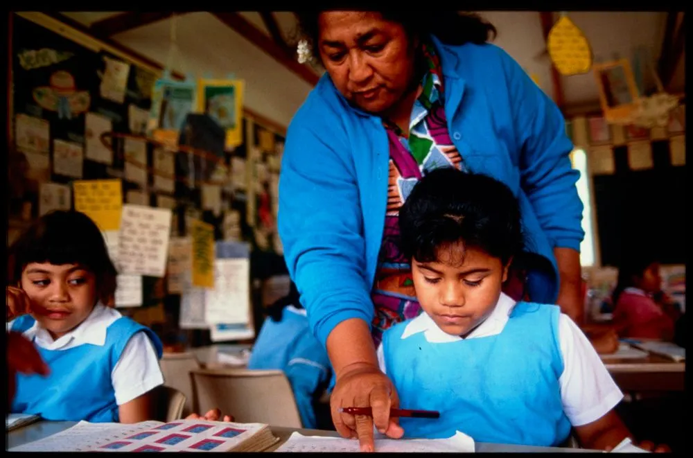 Teacher and children in a classroom