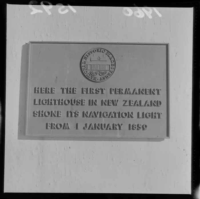 Plaque on Pencarrow Lighthouse that says 'Here the first permanent lighthouse in New Zealand shone its navigation light from 1 January 1859'