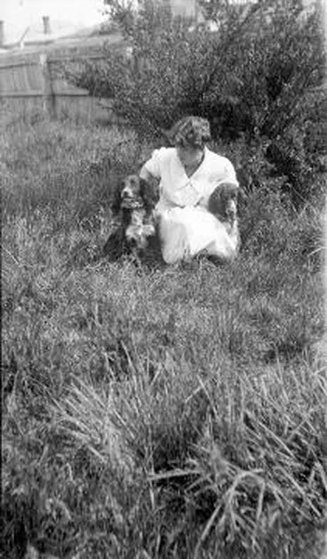 Image: Woman with two dogs : digital image