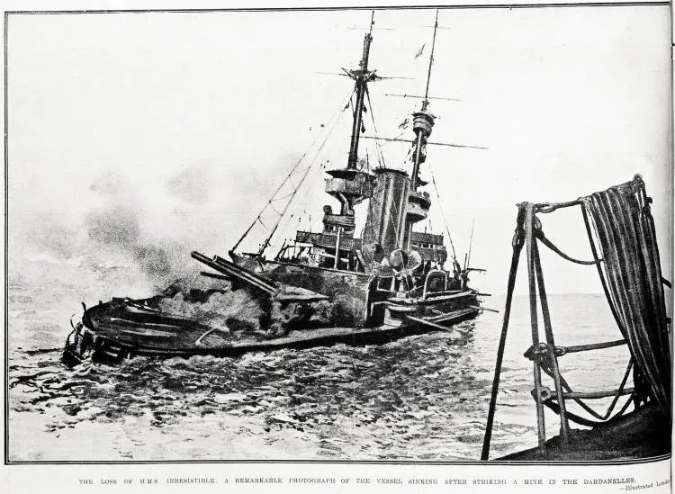 The loss of H.M.S. Irresistible: a remarkable photograph of the vessel sinking after striking a mine in the Dardanelles