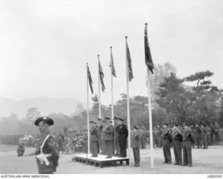 Farewell parade for Lieutenant General (Lt Gen) H C H Robertson, Commander in Chief of the British Commonwealth Occupation Force (BCOF) at Anzac Park in Kure, Japan. Lt Gen Robertson is addressing ..
