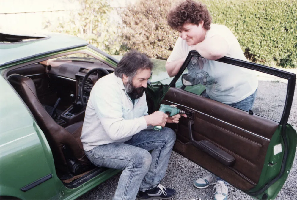 Tom Roe Upholstery; Tom and Marie reupholstering imported used cars.