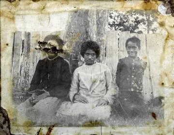 Two young women and a boy : Photograph