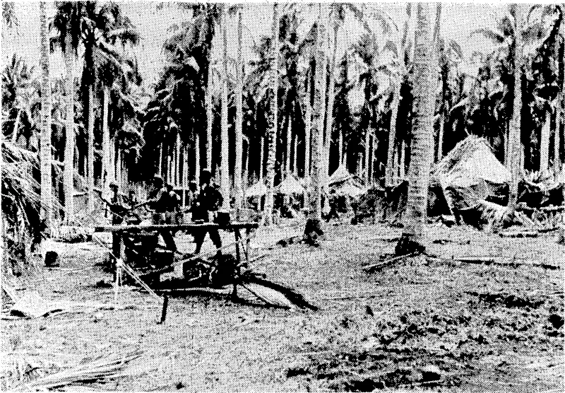 A Japanese camp in the Solomon Islands after-it had been wrecked by United States marines. Even food ivas on the tables when the Americans"appeared. (Evening Post, 07 October 1942)