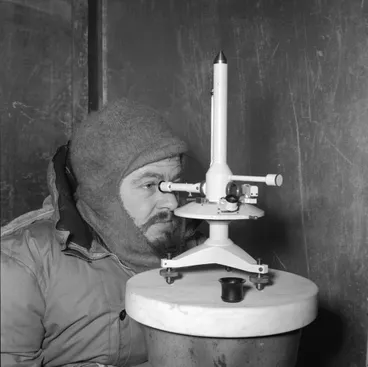 Image: IGY geophysicist taking magnetic observations