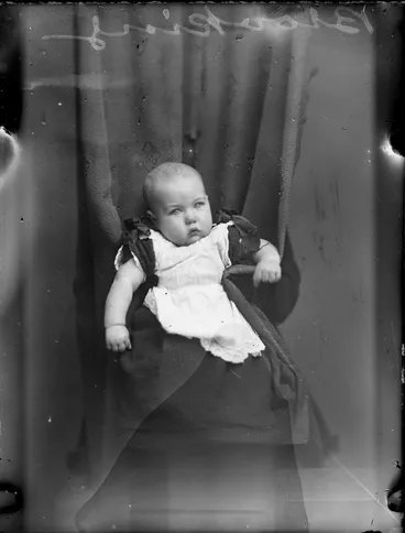 Image: Brooking baby, supported by mother