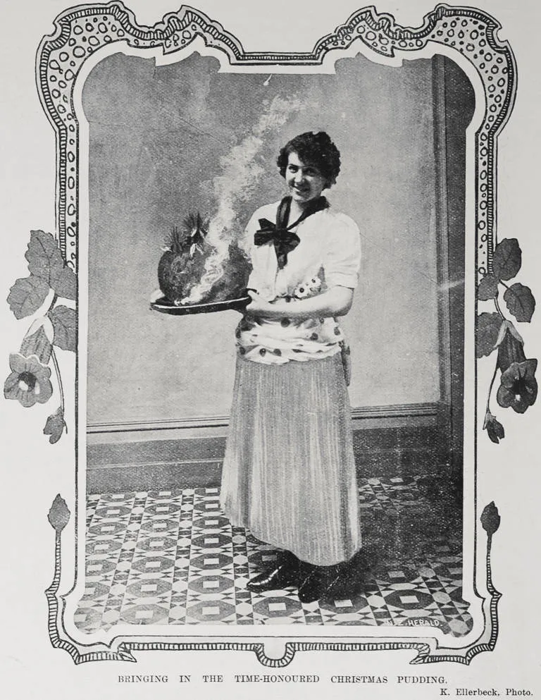 BRINGING IN THE TIME-HONOURED CHRISTMAS PUDDING