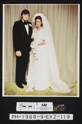 [Hand coloured full length bridal portrait]