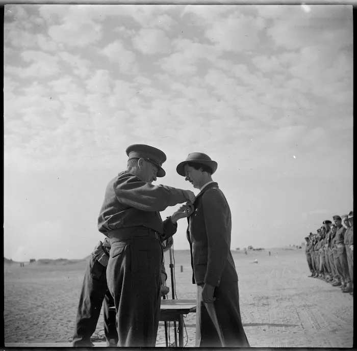 General Auchinleck decorating Matron D I Brown with ARRC ribbon, World War II