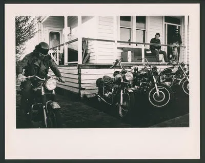 [Highway 61 members and associates socialise outside the Auckland Headquarters]