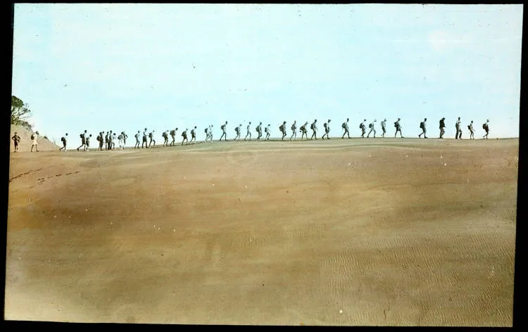 Tramping along sand dunes, Muriwai