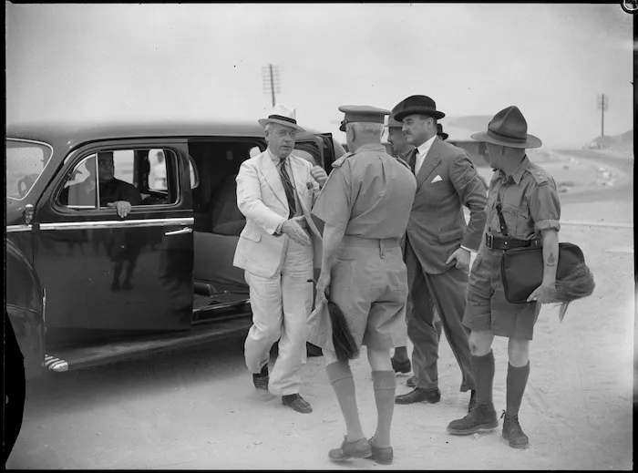 Prime Minister Peter Fraser alights from car, Egypt