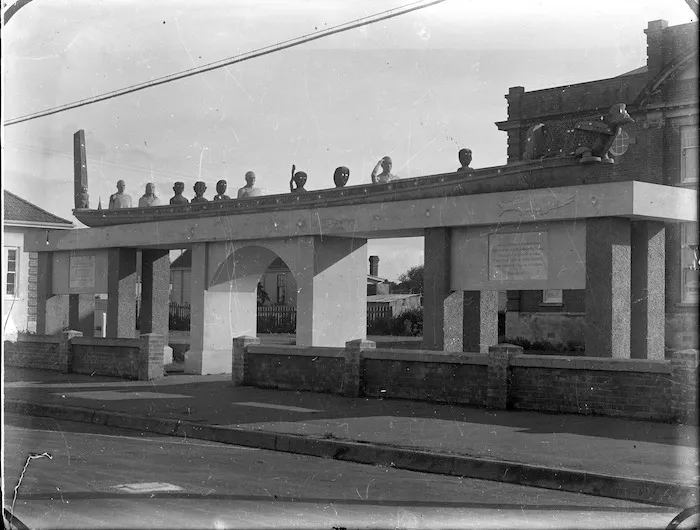 Model of a Maori waka above a gateway at Patea